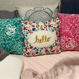 The 3 small floral pillows are good condition. No rips, holes, or stains.